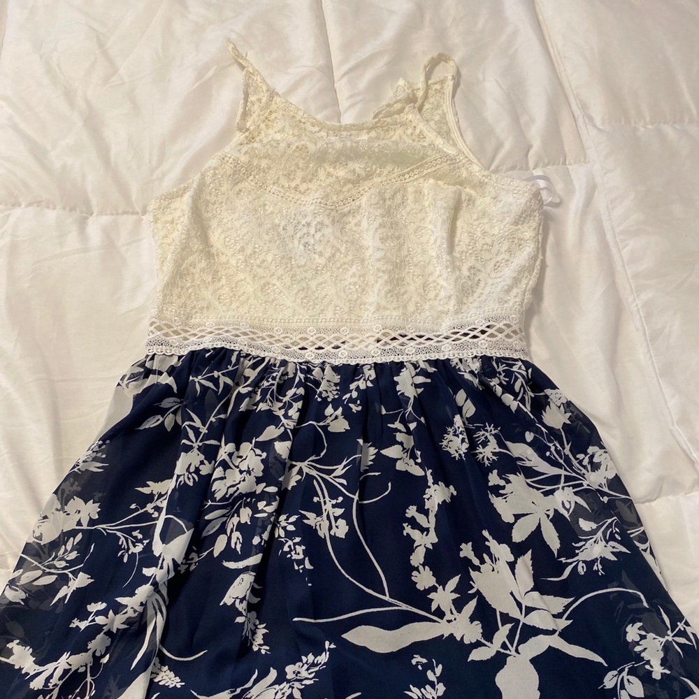 White and blue fit and flare dress.